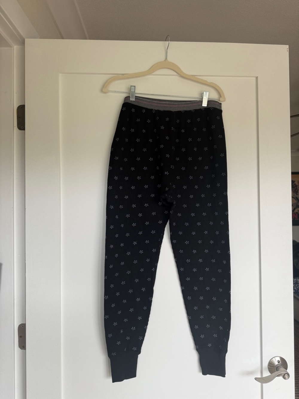 THE GREAT. Black Lounge Pants with Subtle Stripe Detail